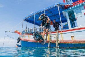 diver jumping off the boat
