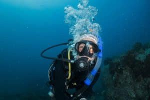 diver looking up smiling 1024x683