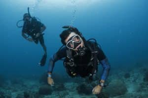 diver pulling silly face