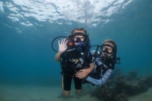 instructor with junior diver