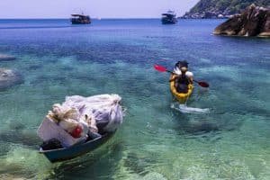 kayak leaving beach 1024x683