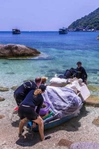 launching boats full of rubbish 683x1024