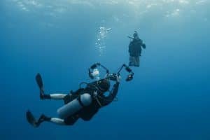 photographer taking a picture of a diver