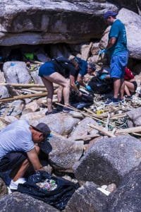 sorting through rubbish 683x1024